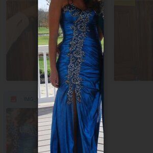 Dramatic metallic teal blue evening gown by Flirt for Maggie Sottero, size 6. Fe